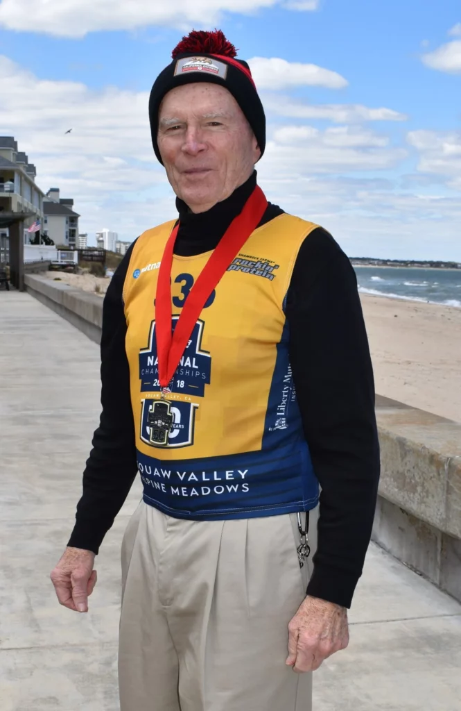 Retired Man Walking on Boardwalk