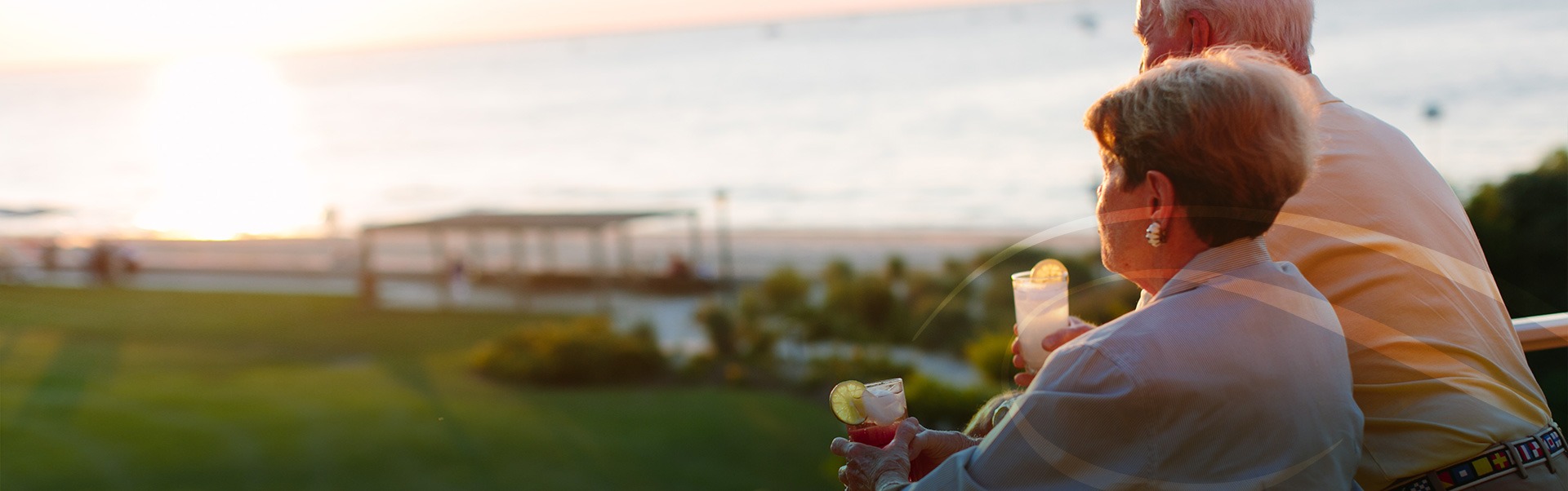 Man and Woman Enjoy Drink on Balcony