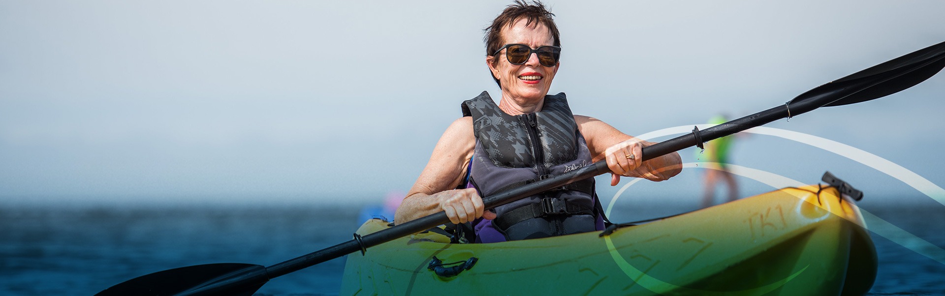 Retired Woman Kayaking on the Chesapeake Bay