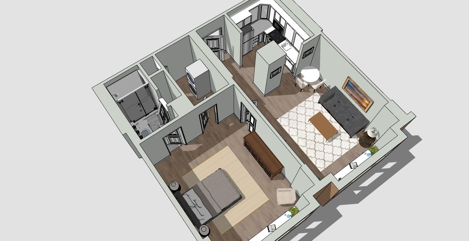 3D floor plan of a one-bedroom apartment. It features a bedroom, bathroom, kitchen, and living room with furniture. The design includes wooden flooring, a rug in the living room, and a picture frame on the wall.