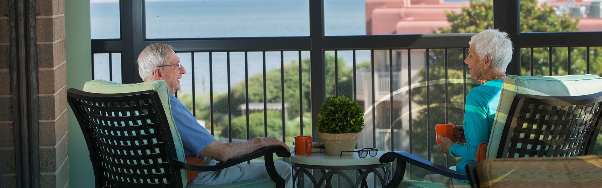 Retired Man and Woman Laughing Together