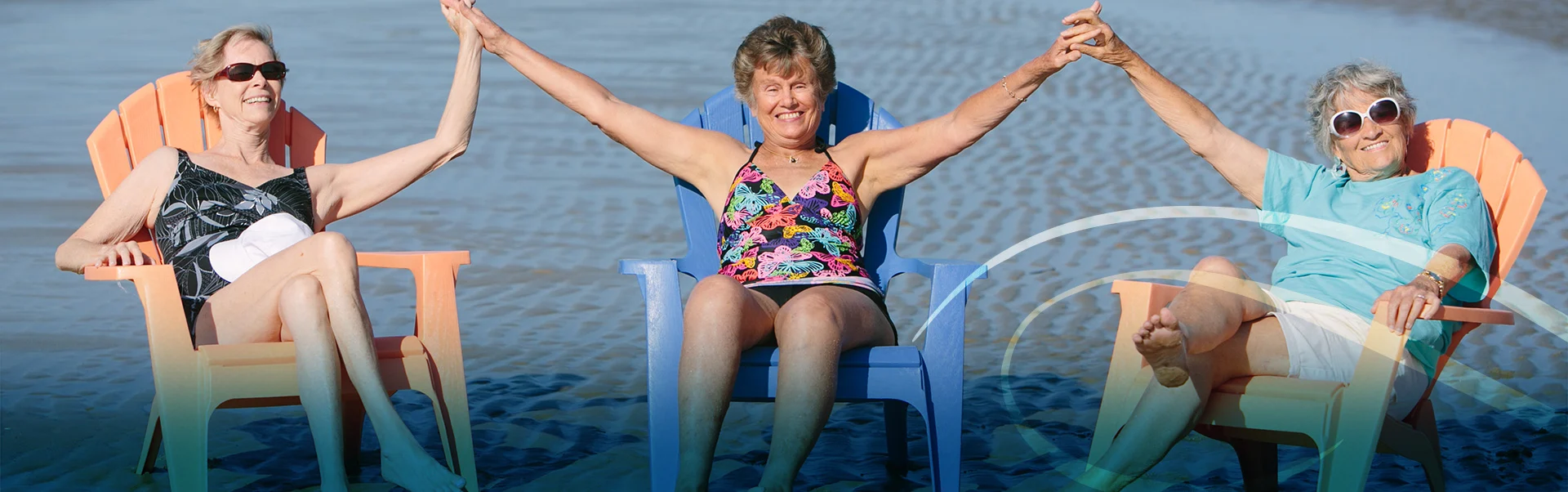 Retired Woman Holding Hands and Smiling on Beach