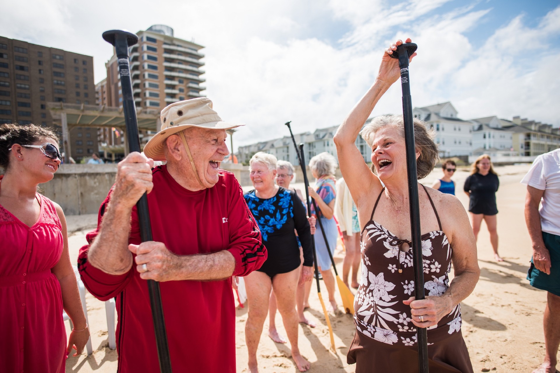 Retired Man and Woman Smiling on the Beach