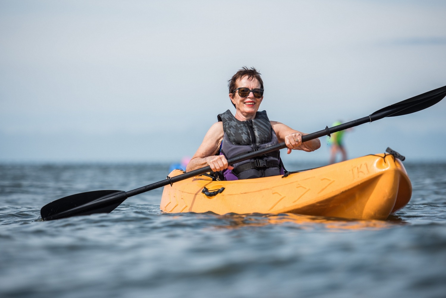 Retired Woman Kayaking on the Chesapeake Bay
