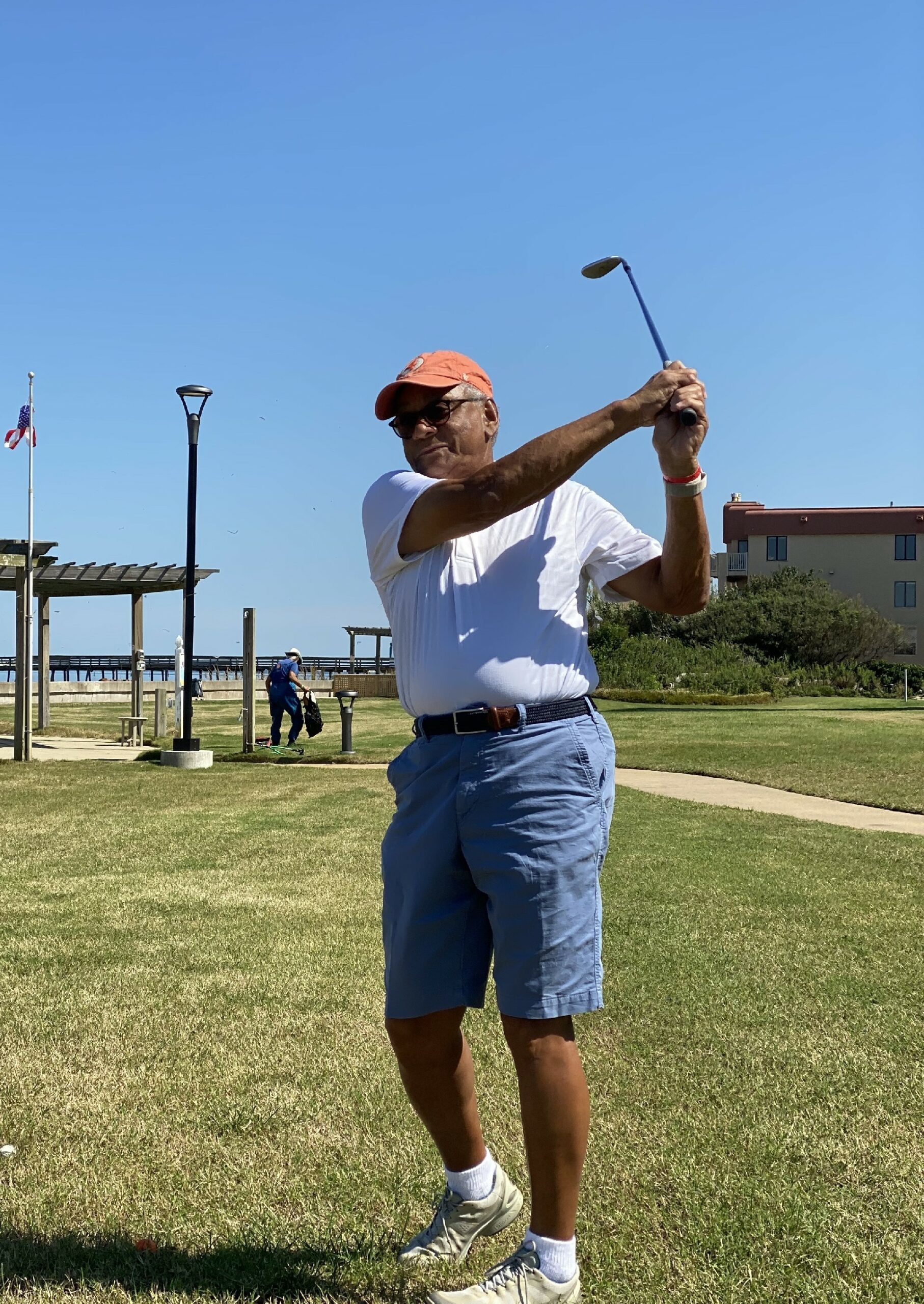 Man Practicing Golf Swing