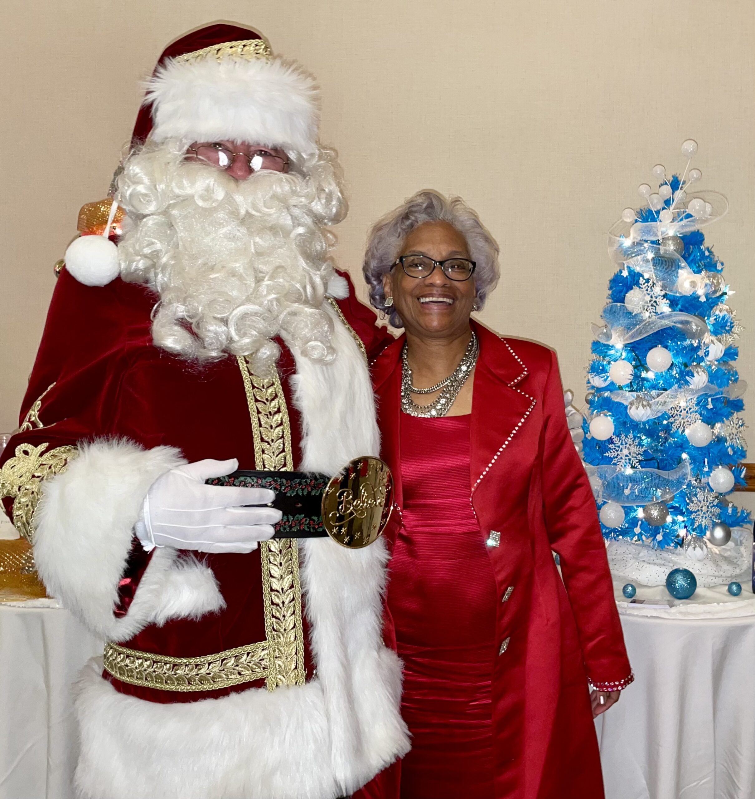 Santa Claus Smiling with Woman at Party