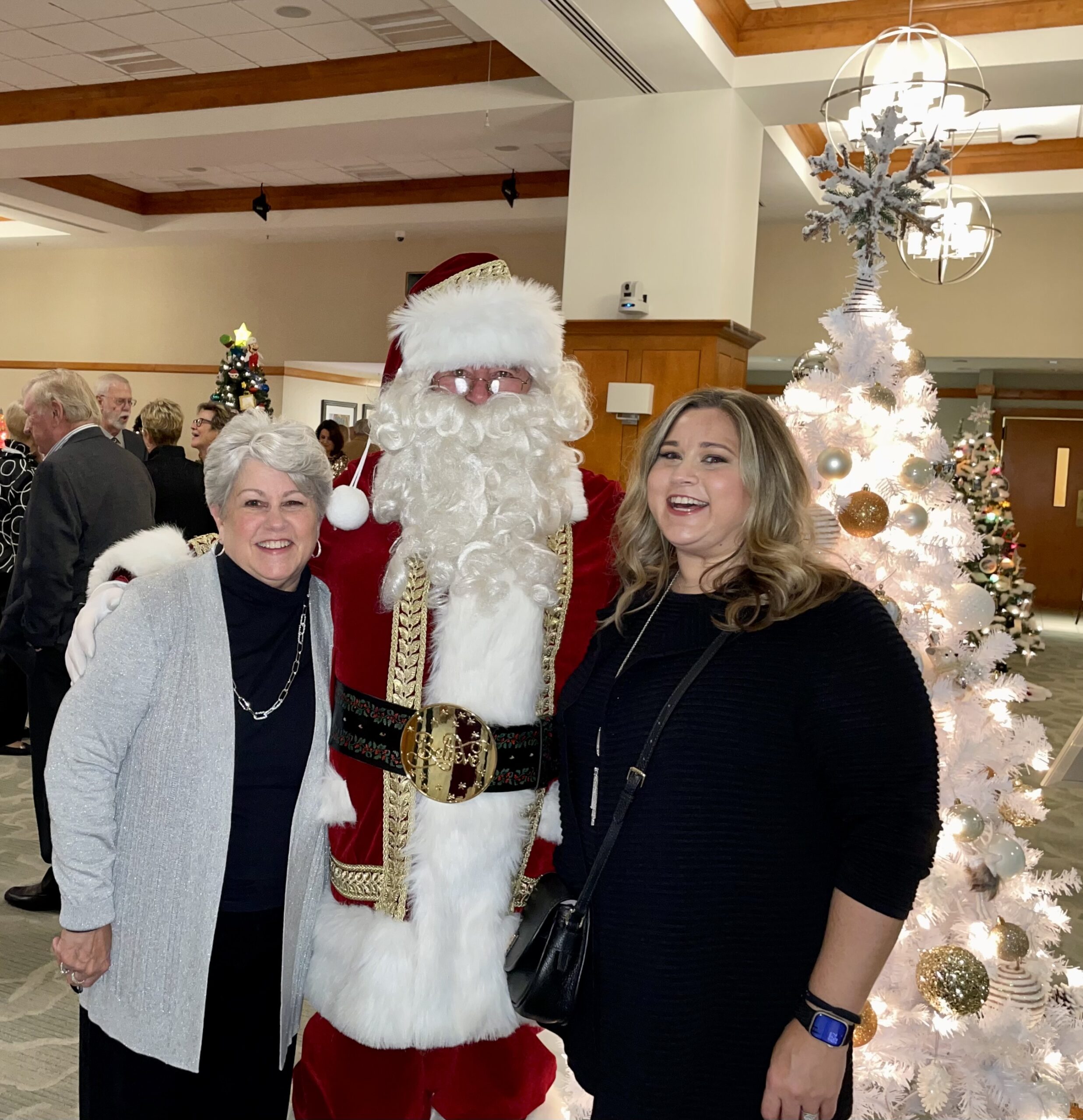 Santa Smiling with 2 Woman