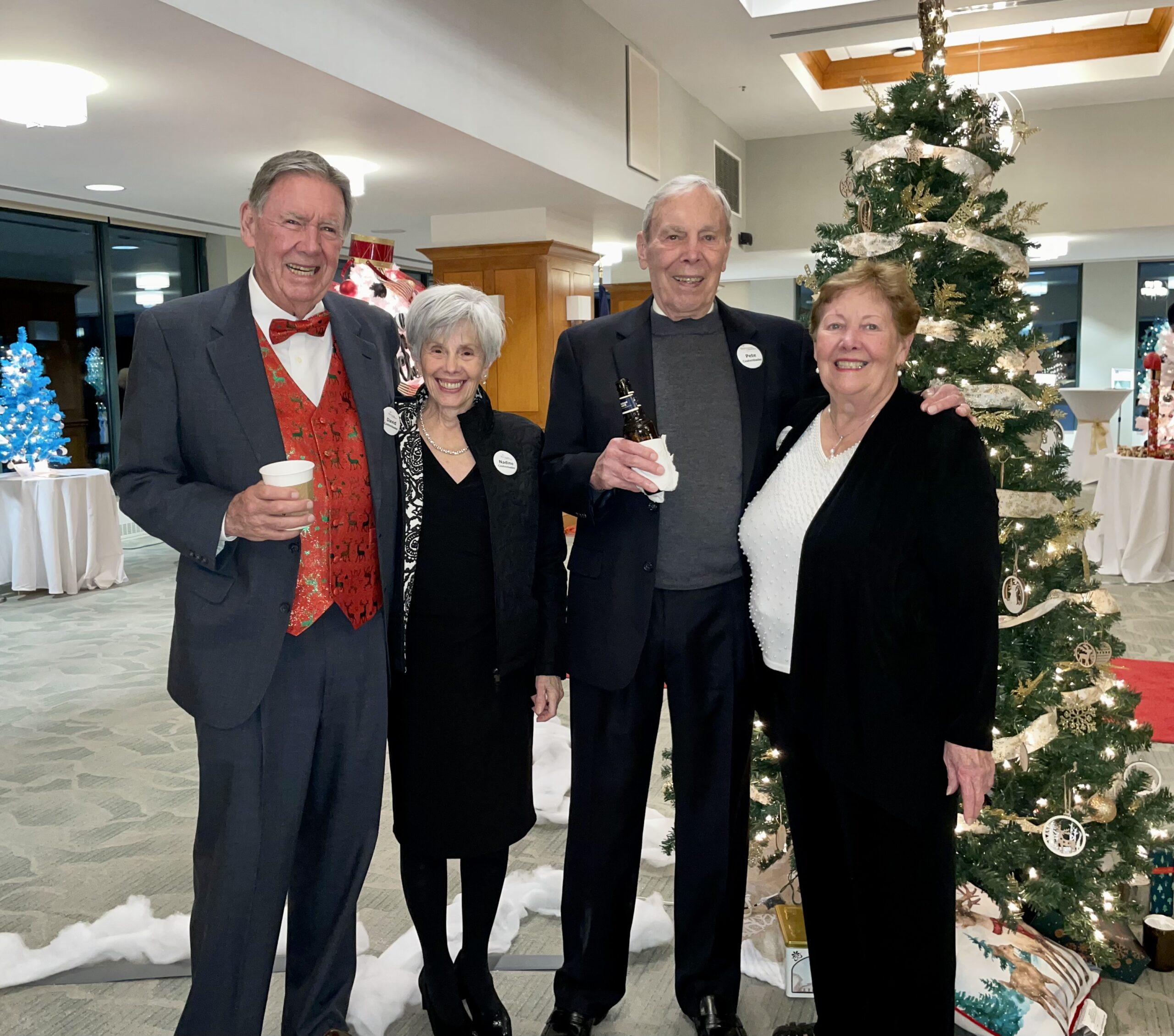 Group of People Smiling at Christmas Event