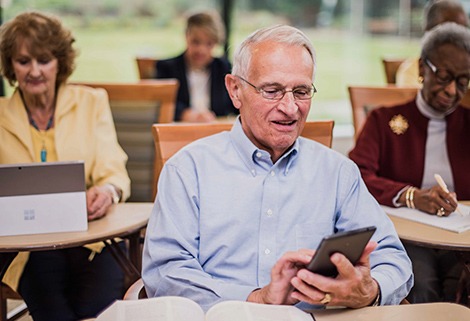Man Holding Tablet
